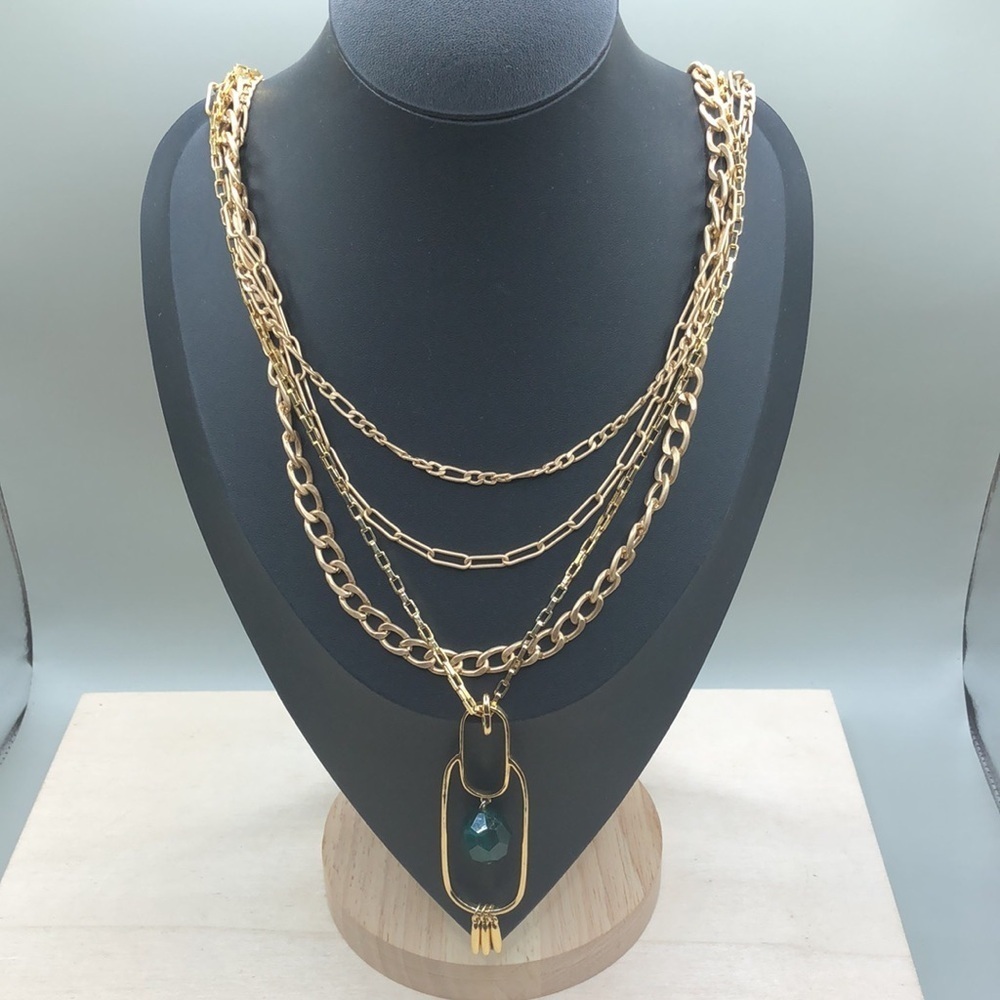 Curated bundle layered statement look necklace Ann Taylor and more.
